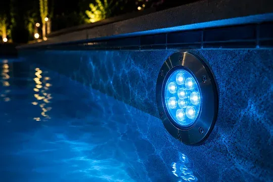 Pool lighting installed around a residential pool in East York